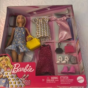 Mattel Barbie Doll with Blue and Pink Dresses